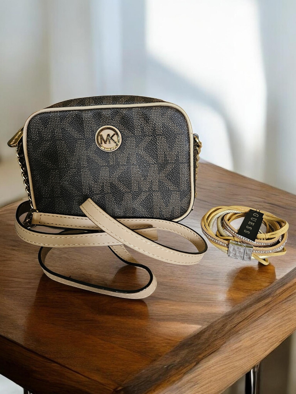 Michael Kors crossbody and Guess glimmer stackable bracelet